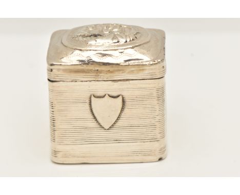 A 19TH CENTURY DUTCH WHITE METAL BOX, the hinged domed cover with repoussé decoration, engine turned sides, with raised vacan