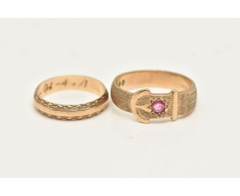 TWO 9CT GOLD RINGS, the first a buckle ring with textured detail, set with a single circular cut ruby in a star setting, hall
