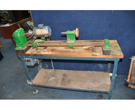 A VINTAGE ARUNDEL M230 WOODTURNING LATHE, with drill chuck fitted, bed length 36in, a Brook Crompton, Parkinson motor and swi