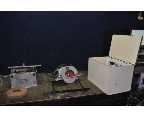 AN ELU MH265 CIRCULAR SAW  with bespoke box, parallel guide, and spare blade along with a Lion Tool whetstone grinder (stone 