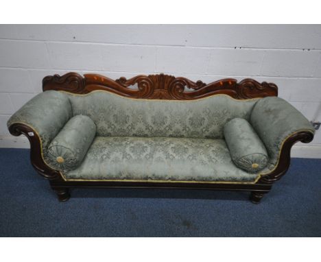 A VICTORIAN WALNUT SOFA, with a scrolled back and turned feet, length 202cm x depth 58cm x height 85cm, condition report: his