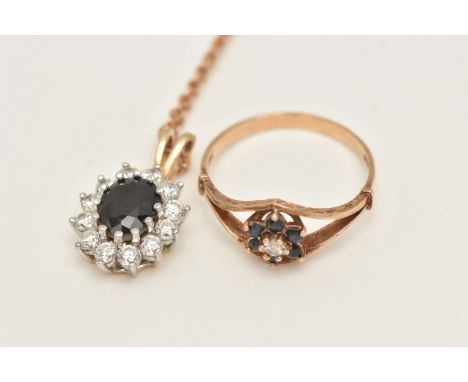 A 9CT GOLD PENDANT WITH CHAIN AND A CLUSTER RING, the oval cluster pendant set with a deep blue sapphire in a surround of col