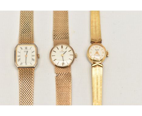 A LADIES 9CT GOLD 'OMEGA' WRISTWATCH AND TWO OTHERS, manual wind 'Omega' with a round silver baton marker dial, polished case