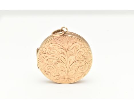 A 9CT GOLD LOCKET, of a circular form decorated with a foliate pattern, hallmarked 9ct Birmingham, fitted with an oval bail, 