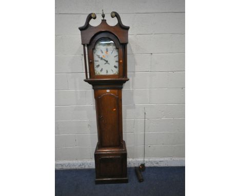 A GEORGIAN MAHOGANY 30 HOUR LONGCASE CLOCK, with twin swan neck pediment, a single brass finial, above an arched glass door, 
