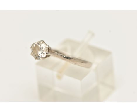 A WHITE METAL SINGLE STONE DIAMOND RING, round brilliant cut diamond, measuring approximately 5.7mm x 5.6mm x 3.2mm, estimate