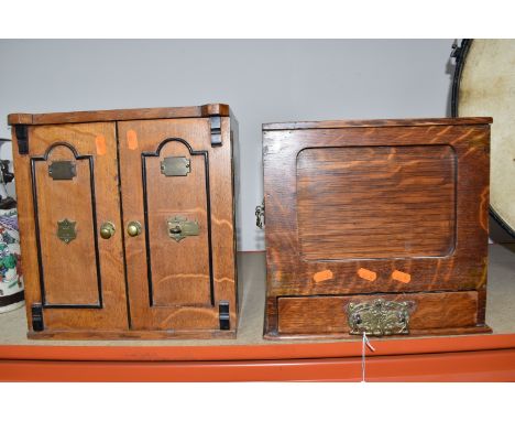 TWO WOODEN VINTAGE SMOKER'S CABINETS comprising a golden oak cabinet with three interior drawer compartments and brass handle