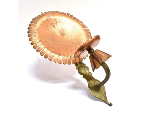 AN ARTS &amp; CRAFTS STYLE WALL SCONCE  the pricket candlestick with copper sconce and reflector, 51cm high