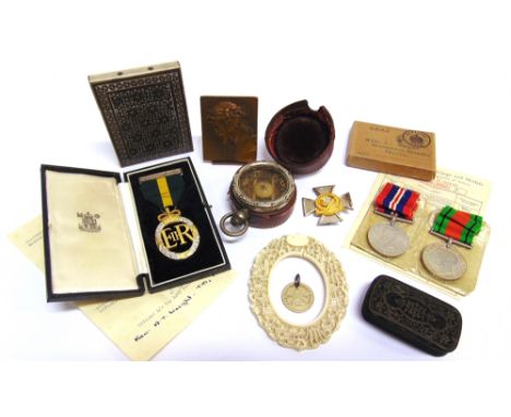 MILITARIA - A SECOND WORLD WAR &amp; LATER GROUP OF THREE MEDALS TO THE REV. A.T. WRIGHT  comprising the Defence Medal and Wa