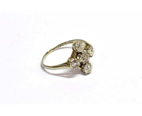 AN EARLY 20TH CENTURY GOLD AND DIAMOND FIVE STONE CRUCIFORM-CLUSTER RING  the five old-cut stones approx. 1.00ct total, each 