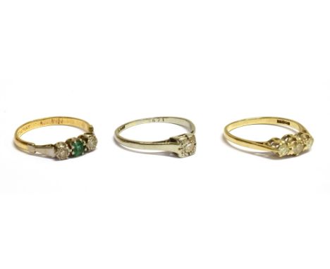 THREE DIAMOND RINGS   comprising; an early-mid 20th century gold and diamond solitaire ring, the round brilliant approx. 0.15