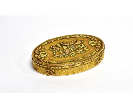 AN EARLY 19TH CENTURY FRENCH GOLD OVAL BOX  the hinged cover with a shaped panel centrally decorated with bloomed-gold flower