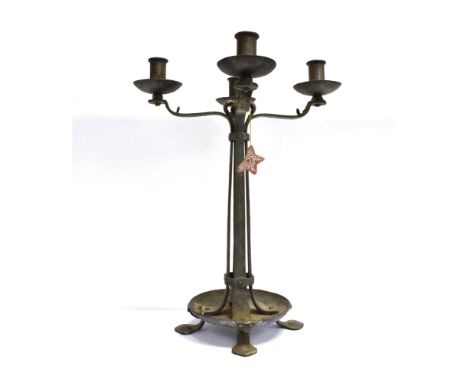 AN ARTS &amp; CRAFTS STYLE FOUR LIGHT METAL CANDLESTICK  46cm high