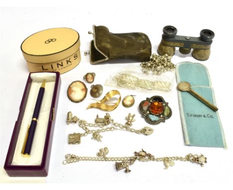 AN ASPREY BALL POINT PEN, CIRCA 1987 AND OTHER ITEMS Including; two silver/white metal 'charm' bracelets; a North African bea