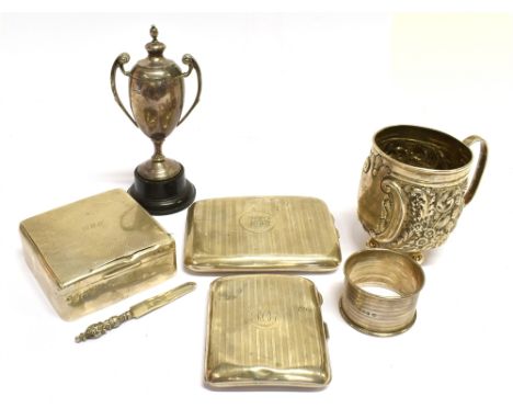 A COLLECTION OF VICTORIAN AND LATER SILVER INCLUDING A CHRISTENING MUG with a 'C' scroll handle, and embossed with a cartouch