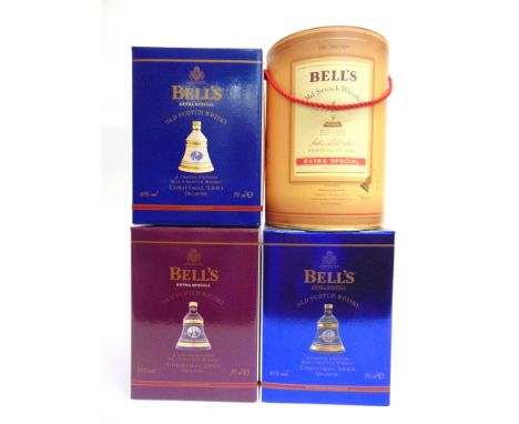 [WHISKY]. FOUR BELL'S DECANTERS BY WADE  comprising Christmas decanters for 2001, 2002 &amp; 2004, each unopened, each boxed;