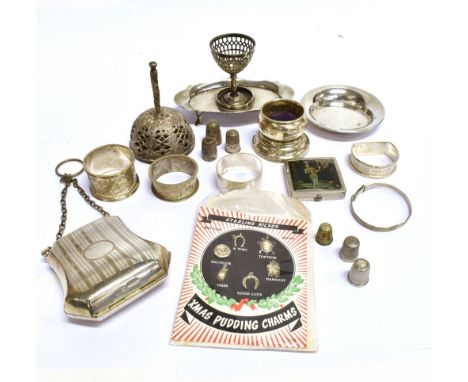 A COLLECTION OF SMALL SILVER INCLUDING THIMBLES AND AN INDIVIDUAL EGG CUP STAND comprising; three silver thimbles, including 