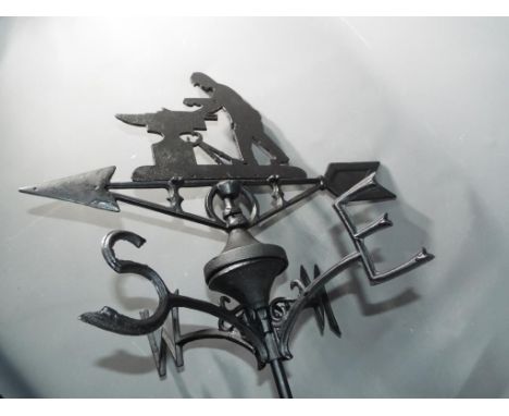A cast iron weather vane depicting a Blacksmith [XWBBW] This lot must be paid for and collected (or despatched) no later than