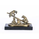 A late 19th century brass desk paperclip of two bears on see-saw,