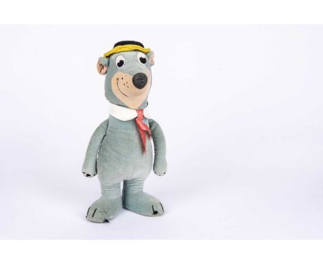 A Merrythought for Hanna Barbera Yogi Bear, circa 1962, of blue velvet, black and white felt eyes, inset cream velvet mouth a