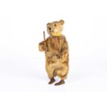 A 1920s German clockwork Teddy Bear violinist,