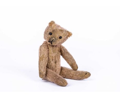 ‘Egbert or Savery', a larger 1st World war ‘soldier’ Teddy Bear, belonged to Christine Savery,  with pinkish mohair, black bo