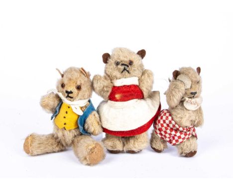 A rare Chad Valley The Three Bears Teddy Bears, 1930s, with beige mohair, orange and black glass eyes, black stitched noses a