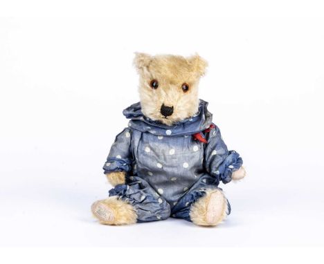 ‘Quincy’, a post-war Chiltern Hugmee Teddy Bear in clown costume,  with golden mohair, orange and black glass eyes, pronounce
