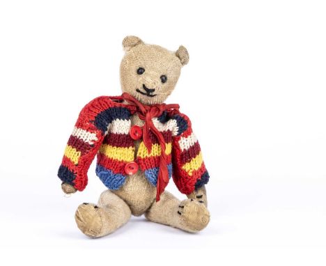 An American ‘stick’ Teddy Bear, 1910-20s from the collection of Colonel Bob Henderson, with blonde mohair, black boot button 