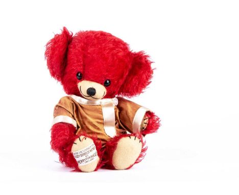 A Merrythought Centenary Alfonzo Cheeky prototype Teddy Bear, with red mohair, black glass eyes, black stitched nose and mout