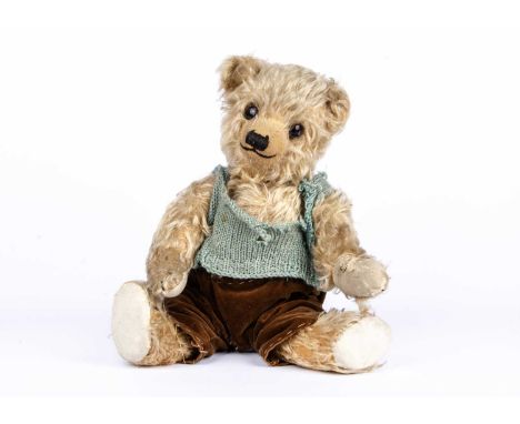 Barnaby, a 1930s Chiltern Hugmee Teddy Bear,  with golden mohair, large oily clear and black glass eyes with brown painted ba