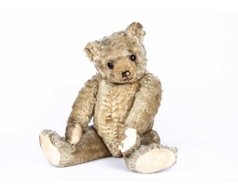 A J.K. Farnell Teddy Bear, similar design to the original Winnie the Pooh, from the Strafford upon Avon Teddy Bear museum, wi