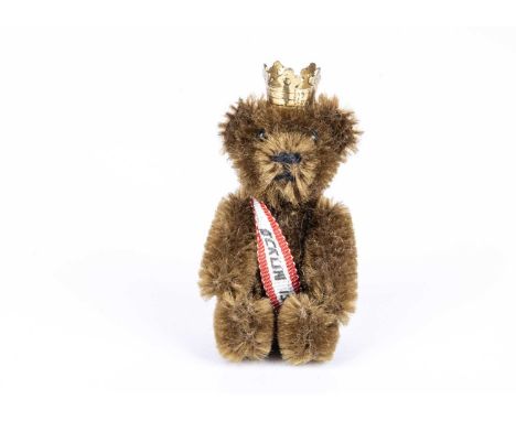 A 1950s Schuco miniature Berlin Teddy Bear from the collection of Colonel Bob Henderson, with brown mohair, black pin eyes, b