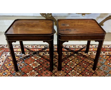 OCCASIONAL TABLES, a pair, in the manner of Arthur Brett in the Chippendale style flame mahogany on stretchered legs, 50cm x 