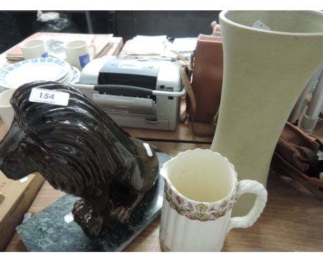 A ceramic lion on marble base signed Brayton and a Hilstonia pottery vase etc