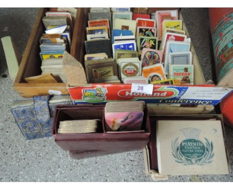A large selection of vintage playing cards and card games including advertising