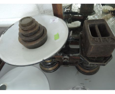 A set of Standard J. Garland and Co scales and weights