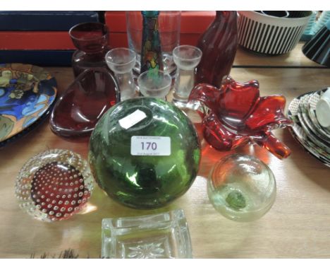 A selection of glassware including ruby art glass, fisherman's float, paperweights etc