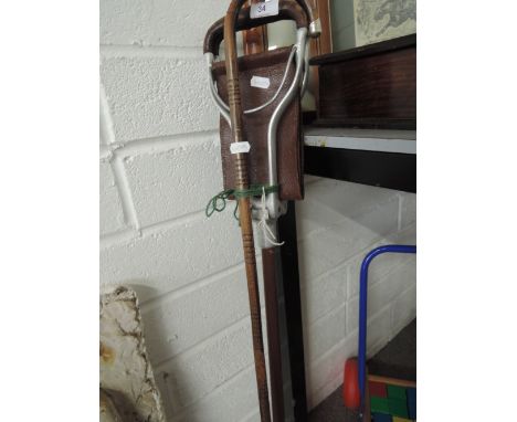 A walking cane with HM silver tip and a shooting stick