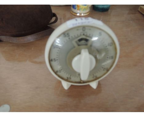 A Smiths clockwork ringer oven timer