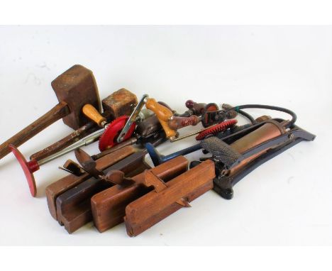 Collection of various tools, to include wooden moulding planes, wooden mallets, Ixion hand drill, Dunlop Major foot pump etc.