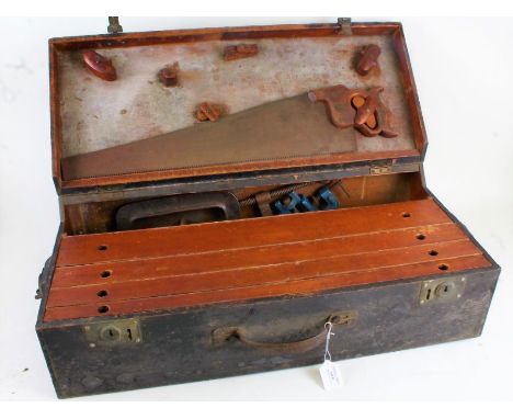 Carpenters tool chest, containing a hand saw, four clamps, chisel blades etc.