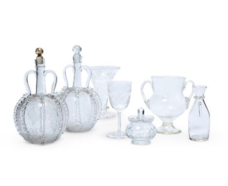 A PAIR OF DUTCH ENGRAVED GLASS BOTTLE FLASKS AND ASSOCIATED STOPPERSVARIOUS DATESdecorated with bunches of grapes and birds i