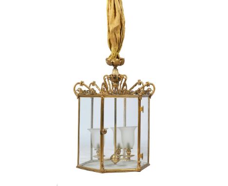 A GILT METAL AND EIGHT GLASS HALL LANTERN IN THE REGENCY STYLEEARLY 20TH CENTURY AND LATER  Of octagonal form, with foliate c