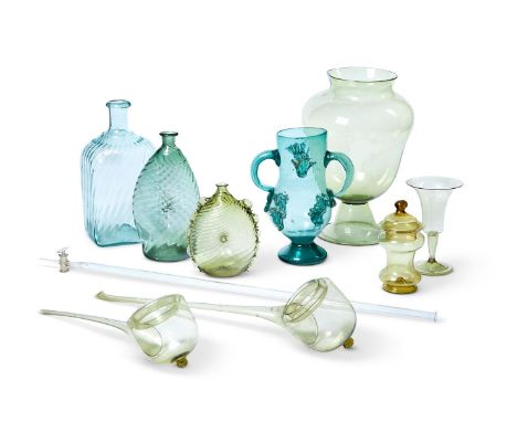 A SELECTION OF CONTINENTAL PALE GREEN AND YELLOW GLASSVARIOUS DATES Including a leach jar30cm highProvenance: Supplied by Oli