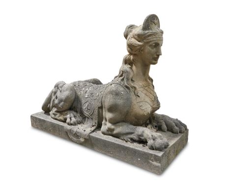 A PAIR OF COMPOSITION STONE SPHINXES  20TH CENTURY, AFTER THE MODEL BY GUELPHI AND CHEERE  Modelled opposing and saddled Each