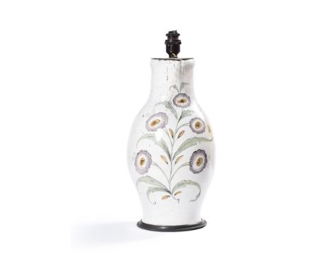 A GERMAN FAYENCE PEWTER-MOUNTED POLYCHROME JUGMID 18TH CENTURYadapted as a lamp, the jug 39cm highProvenance:Supplied by Oliv