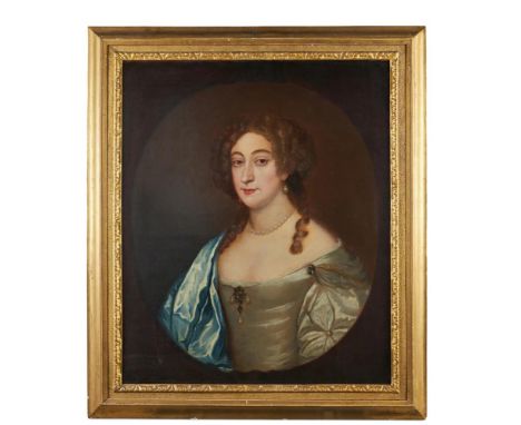 ENGLISH SCHOOL (17TH CENTURY)A LADY WITH A PALE BLUE SATIN WRAP AND PEARL EARRINGS IN A PAINTED OVAL74.9 x 62.2cm (29¼ x 24¼ 