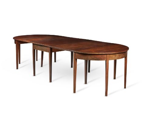A GEORGE III MAHOGANY D-END DINING TABLECIRCA 1780With central drop flap section, the ends on square tapering legs 73cm high,