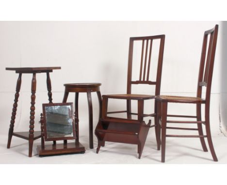 A collection of furniture to include 2 Edwardian bedroom chairs, a Victorian carved oak triangular side table, an Edwardian m